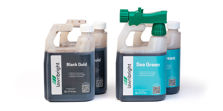 Lawnbright products, Black Gold and Sea Green with an applicator nozzle attached.